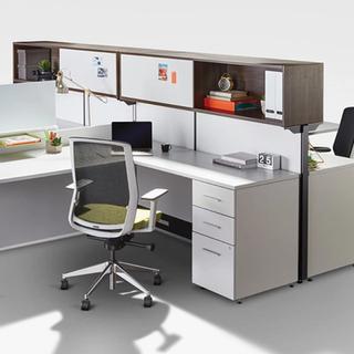 Office workstation with chair, desk, and various cabinets