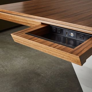 Carina table with exposed cabling drawer