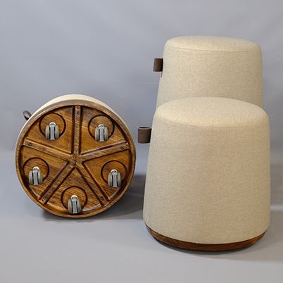 Multiple white mom ottomans with shot of wheels