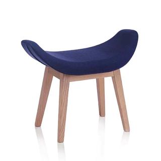 Dark blue foot rest that is curved with wood legs