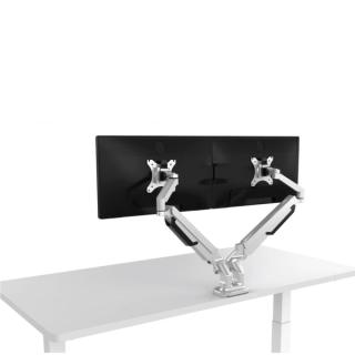 Dual monitors attached by arms to desk
