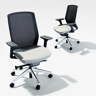 Different angles of a black and white task chair