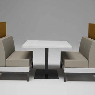 Two booths and white table