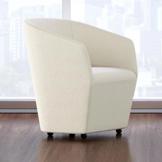 Swerve chair in white on wood floor with wheels