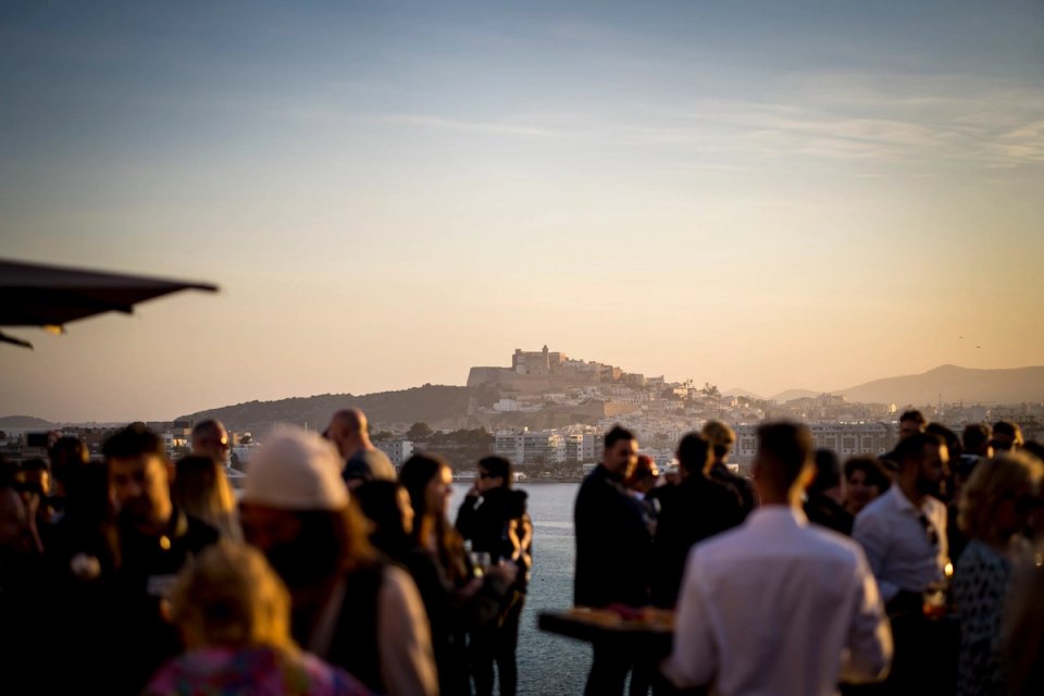 Teambuilding Ibiza group having cocktail dinner on rooftop of hotel Ocean Drive Talamanca