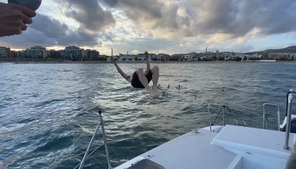 Corporate group on a private catamaran on the Mediterranean during a Barcelona incentive trip organised by Nessout