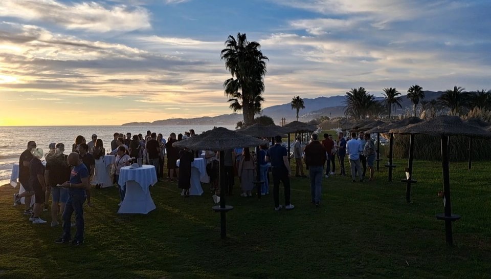 Spain Malaga company trip cocktail dinner at sunset on the beach