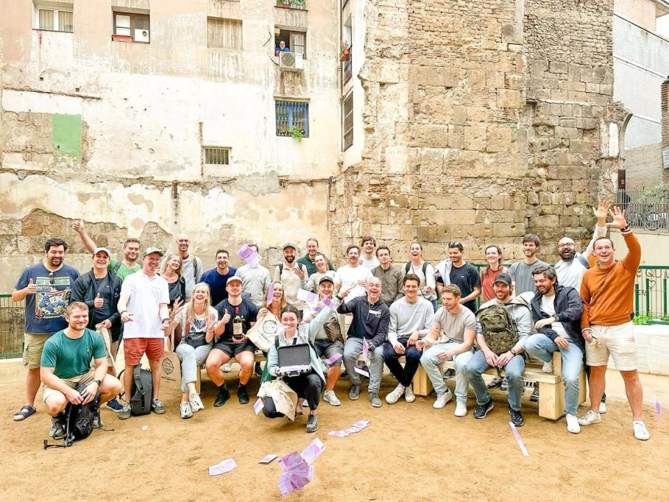 Full group photo after a teambuilding activity in the historic centre of Barcelona organised by Nessout