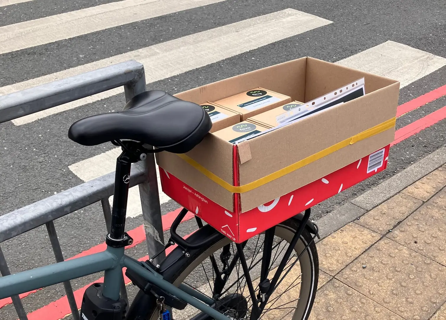 Box in bicycle to deliver tests to participants