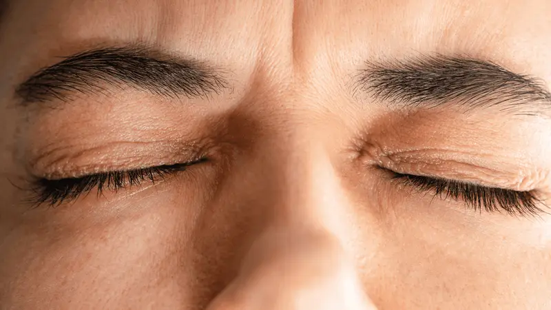 woman with closed eyes - Semaglutide Eye Side Effects