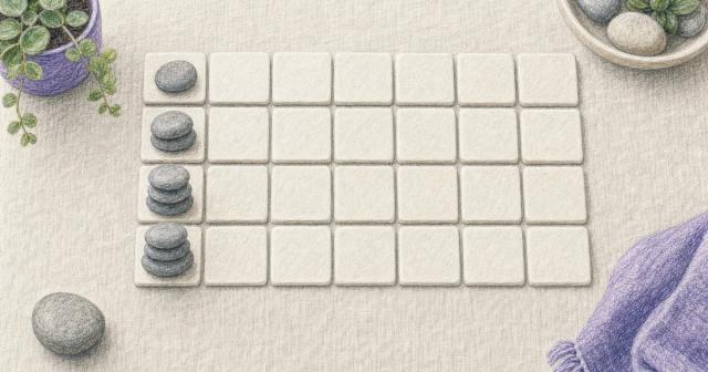 Grid of blank ceramic tiles in four rows with pebble stacks growing taller each row