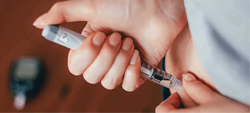 person injecting - Microdosing Semaglutide