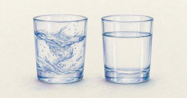 Two glass vessels side by side, one swirling and one calm.