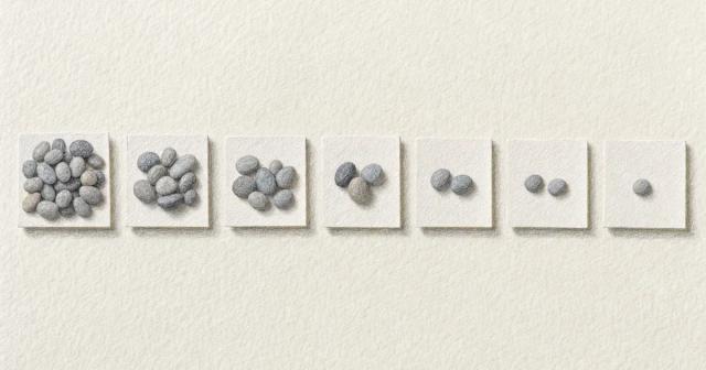 Row of seven paper cards holding pebble clusters that thin out from left to right