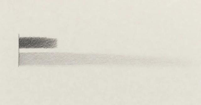 Hand-drawn diagram of a short dark band above a long pale band fading to the right
