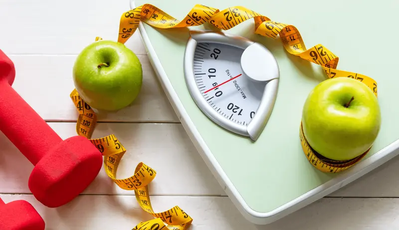 Fitness equipment, scale, and healthy fruit - Semaglutide for Weight Loss in Non-Diabetics Dosage