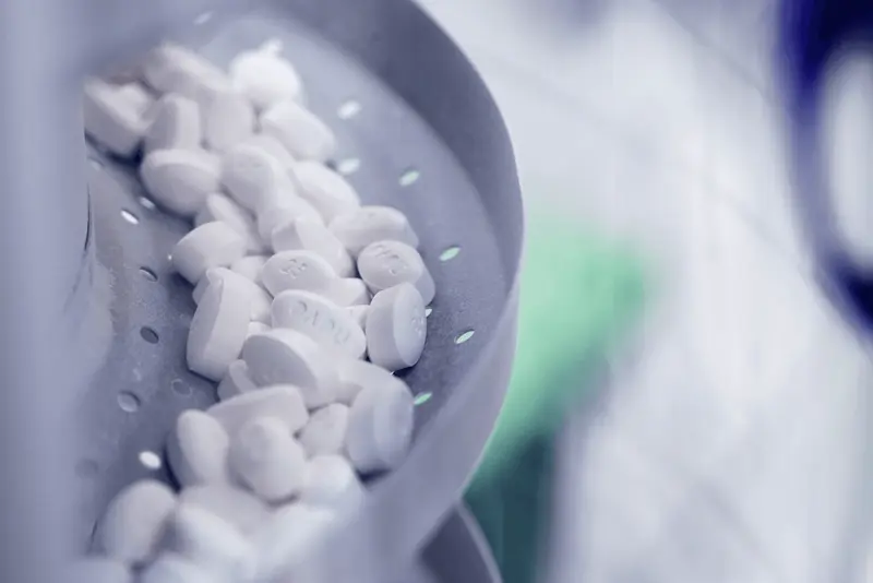 Pile of white medical pills - Cost of Oral Wegovy