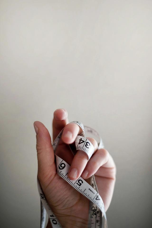 measuring tape in hand - How Long Does Tirzepatide Take to Work