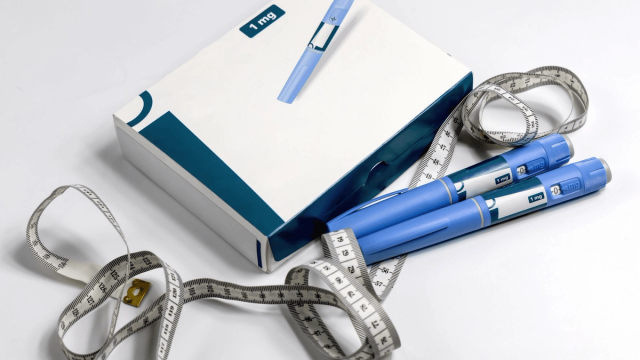 Wegovy pens and measuring tape display - Semaglutide Visceral Fat
