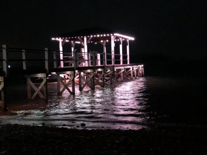 Permanent LED dock lighting on an Upstate lake at dusk