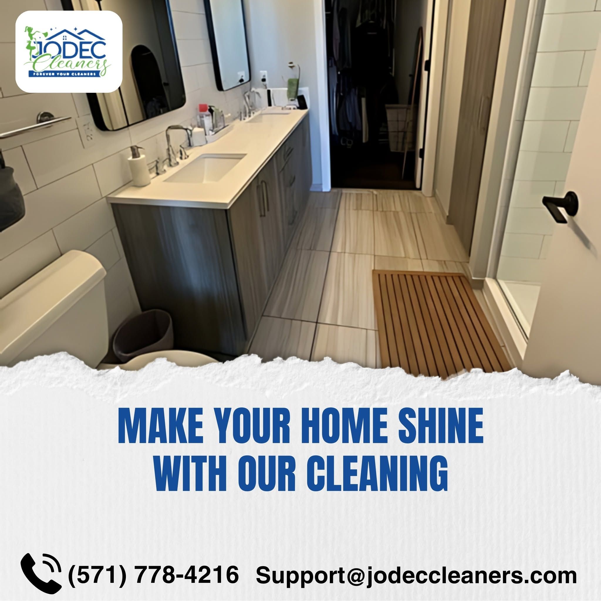 A spotless bathroom and hallway prepared by Jodec Cleaners before move-in day