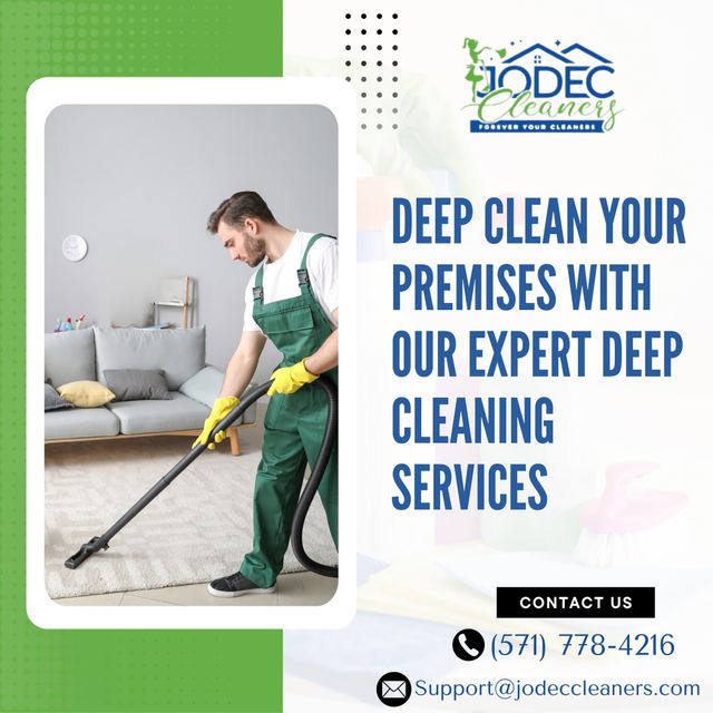 A Jodec Cleaners crew member deep cleaning carpets in a Northern Virginia living room