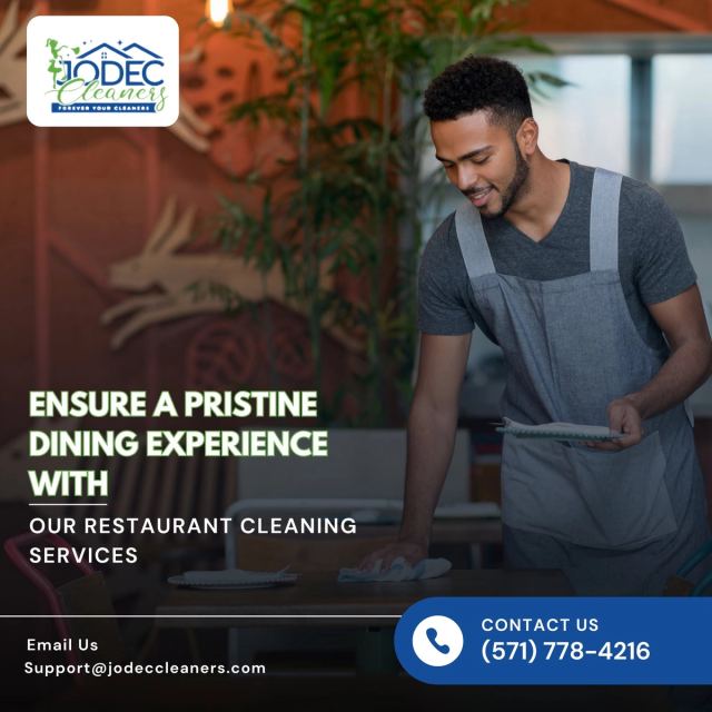 A Jodec Cleaners team member preparing a Northern Virginia restaurant dining room