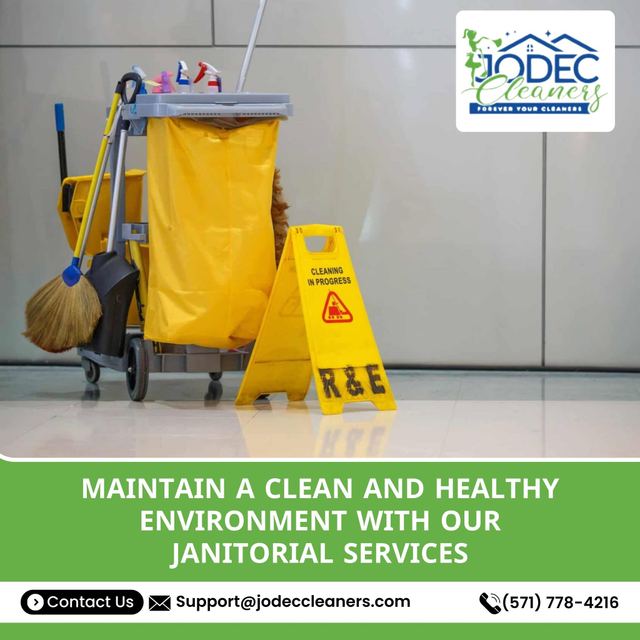 Professional janitorial cart and wet-floor sign during a Jodec Cleaners facility clean
