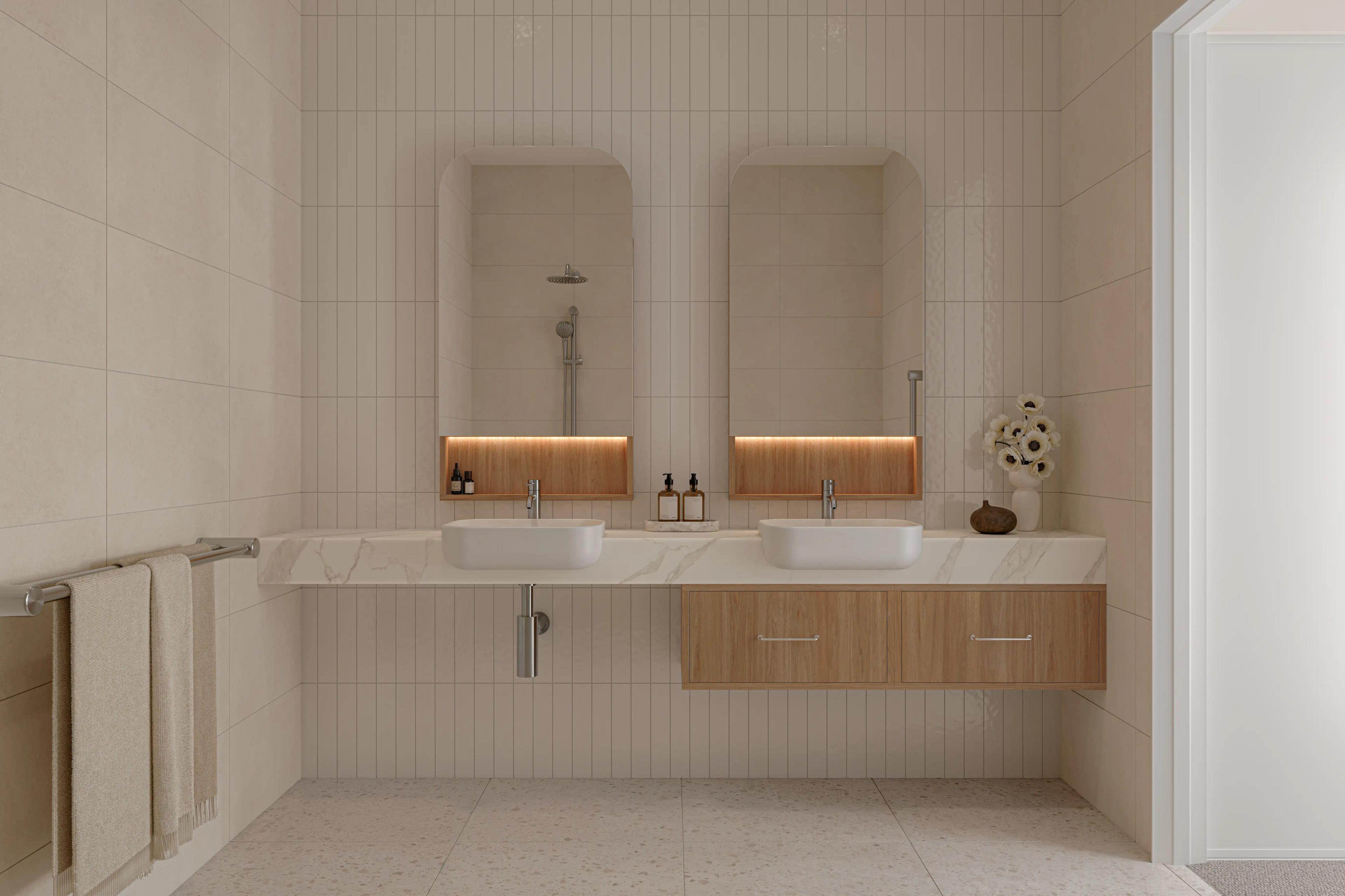 Ensuite to off main bedroom with a double vanity, two mirrors, cream tiled walls and flooring, timber finishings.