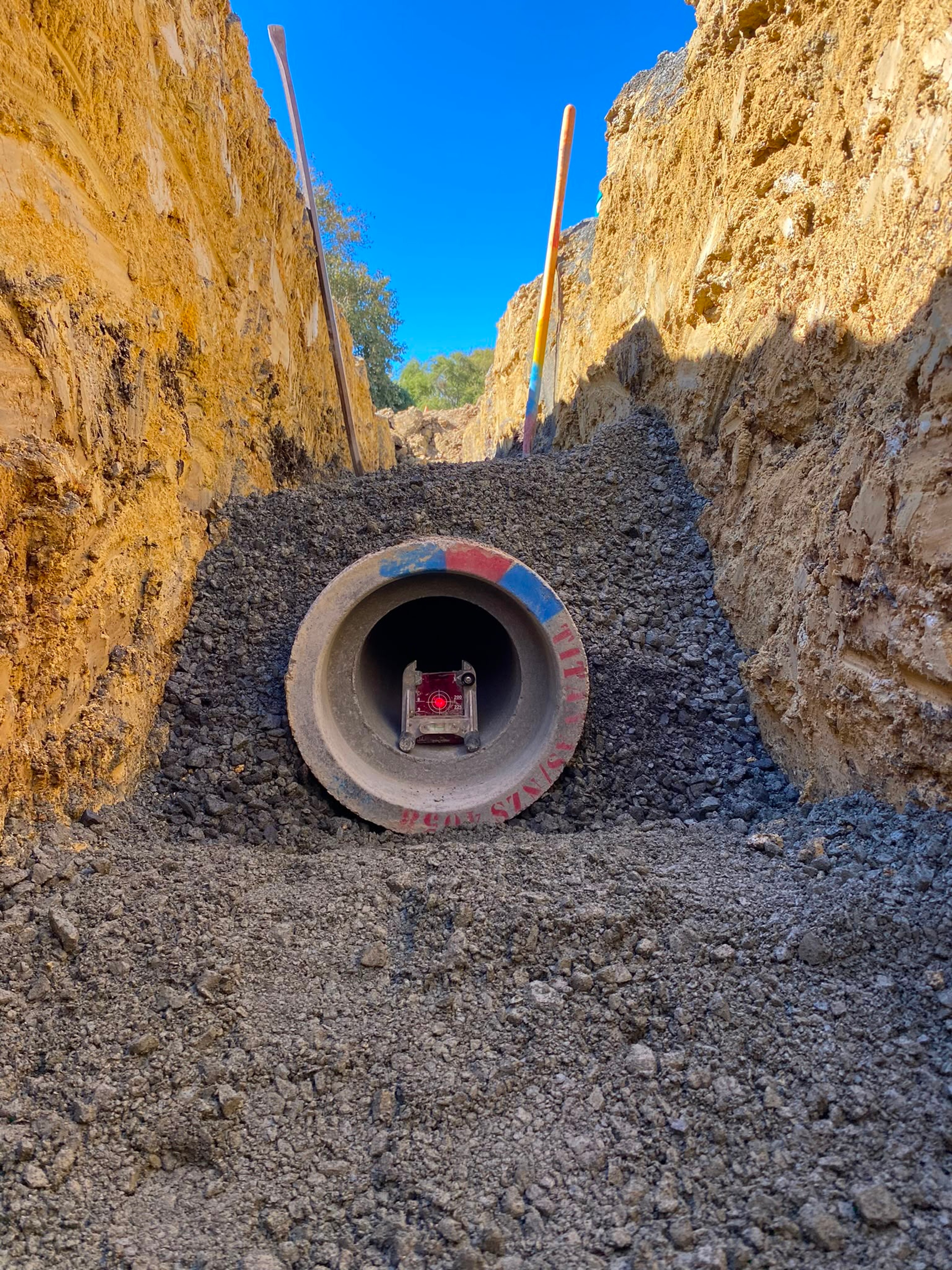 Concrete culvert outlet bedded in drainage metal