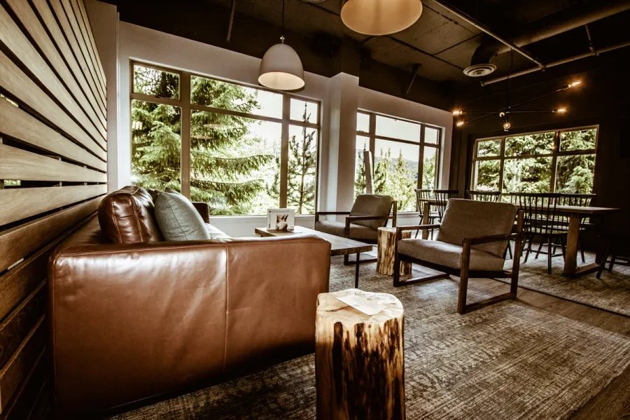 Whistler Medical Aesthetics waiting room with mountain forest views.