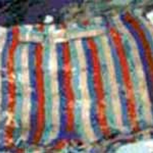 A photo of Multi-colored swim shorts the decedent was found wearing