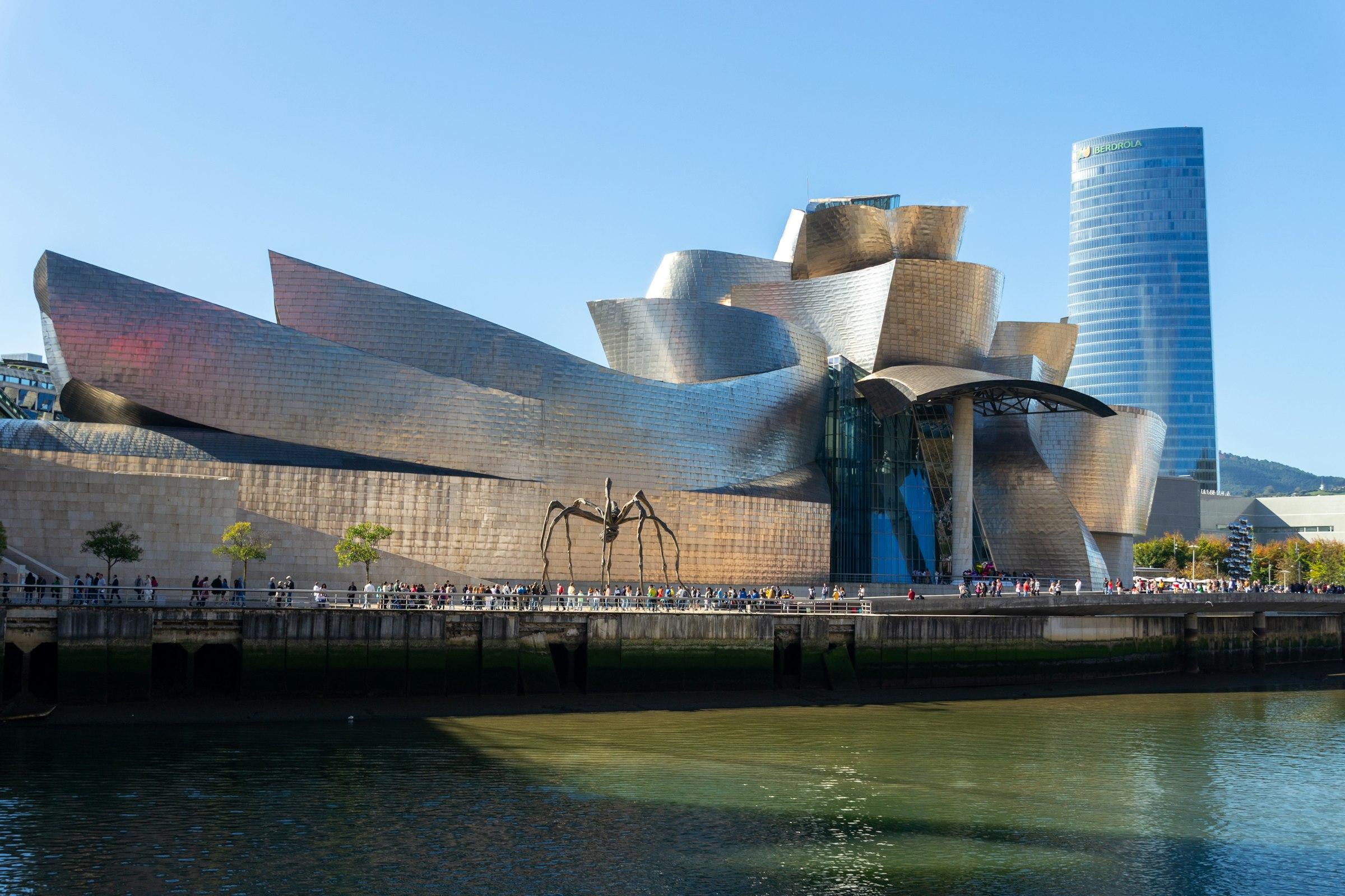 A large public building beside a body of water