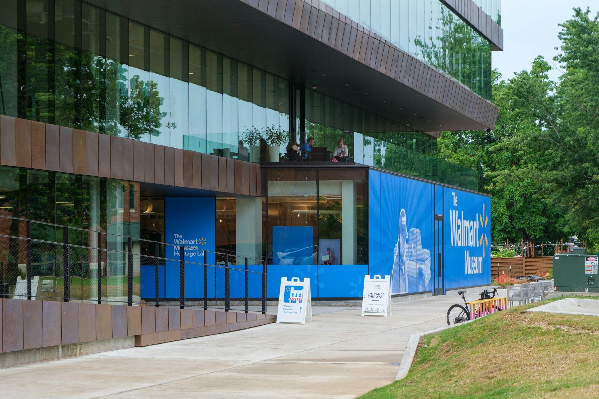 Modern building wrapped in blue construction banners