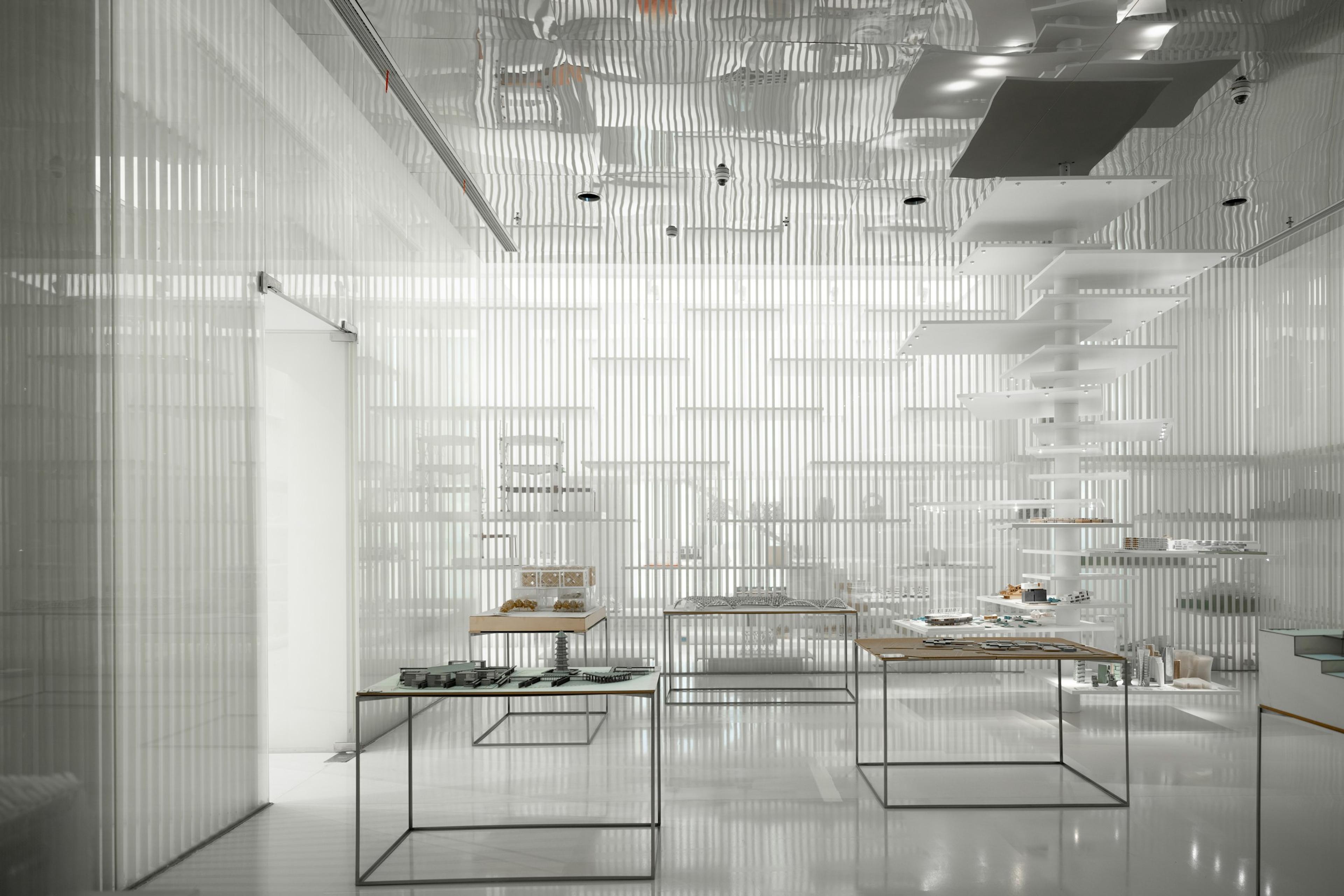 A room filled with pale furniture and diffuse light