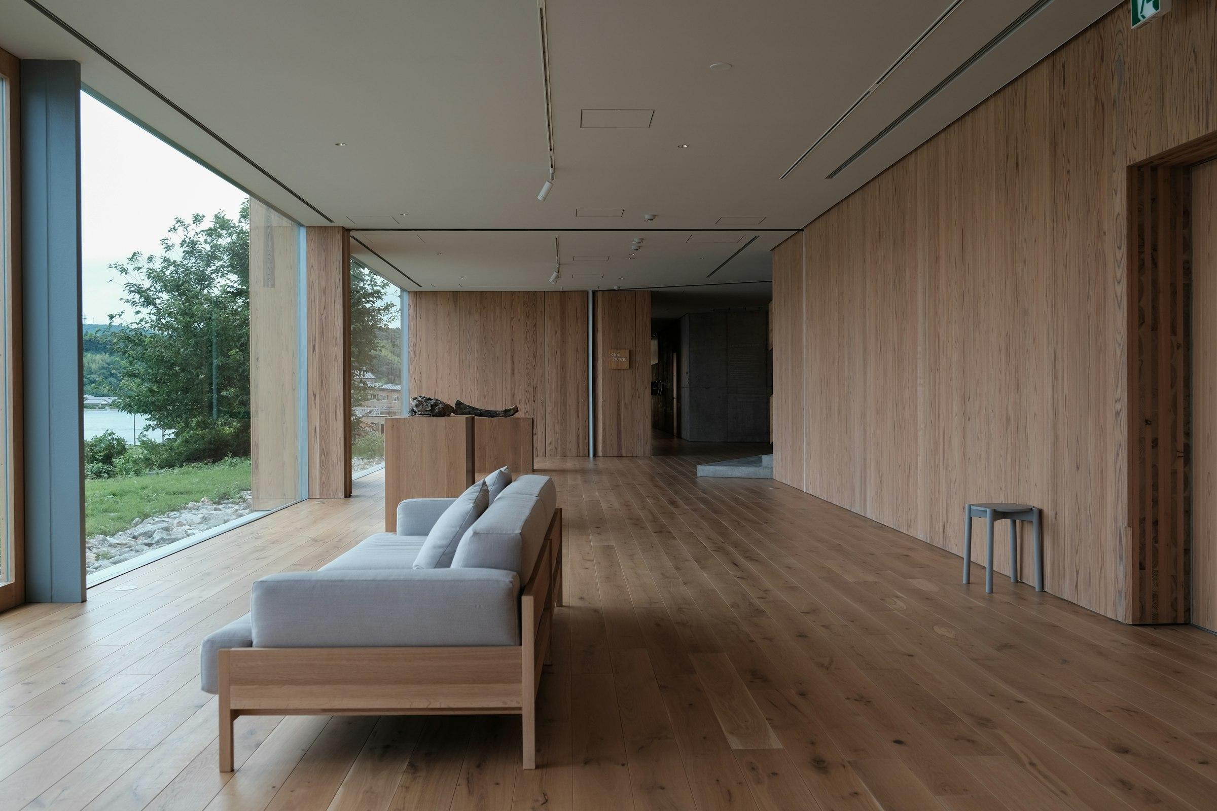 A pale sofa on a timber floor