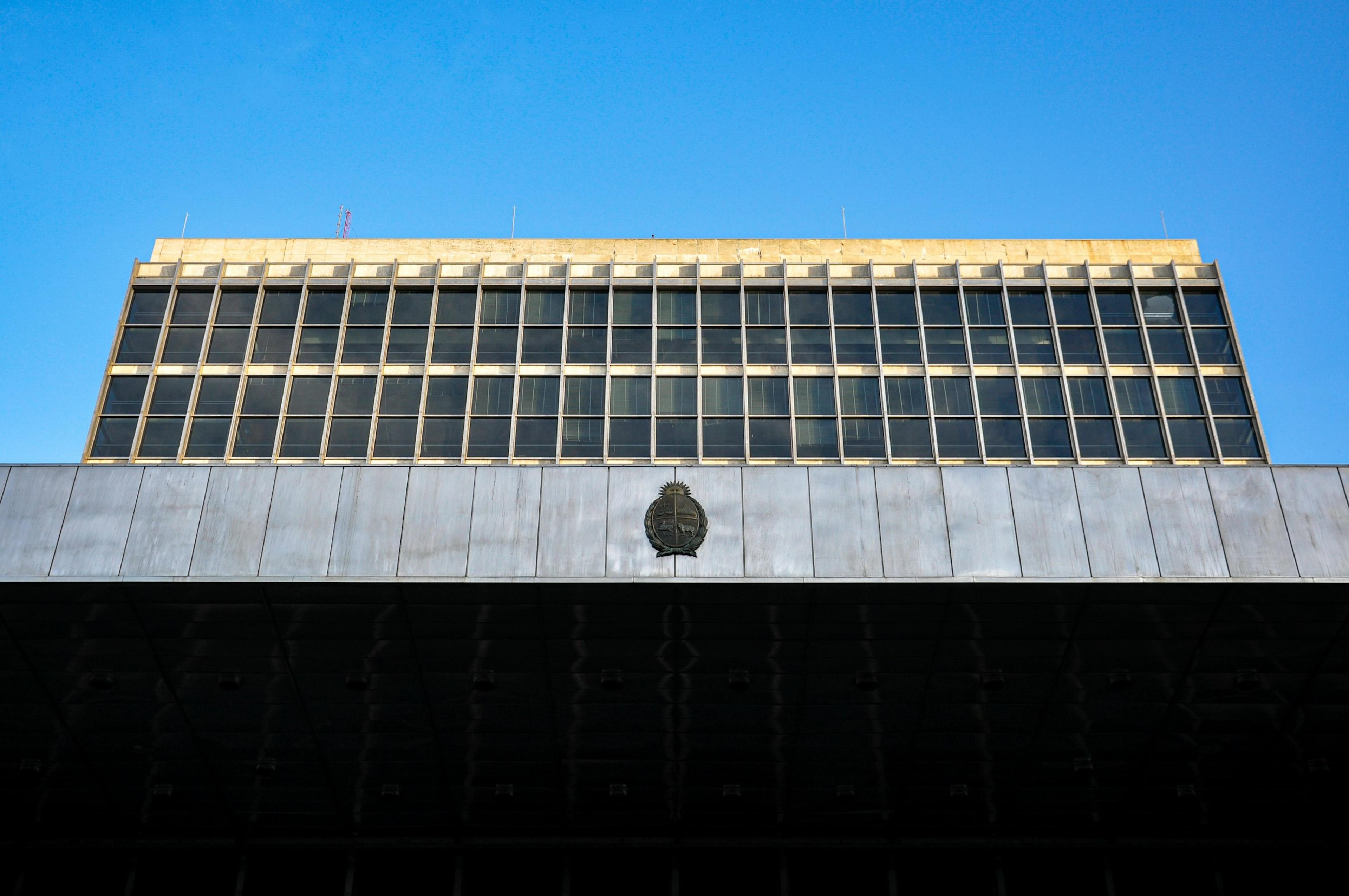 Modern building facade against a clear blue sky