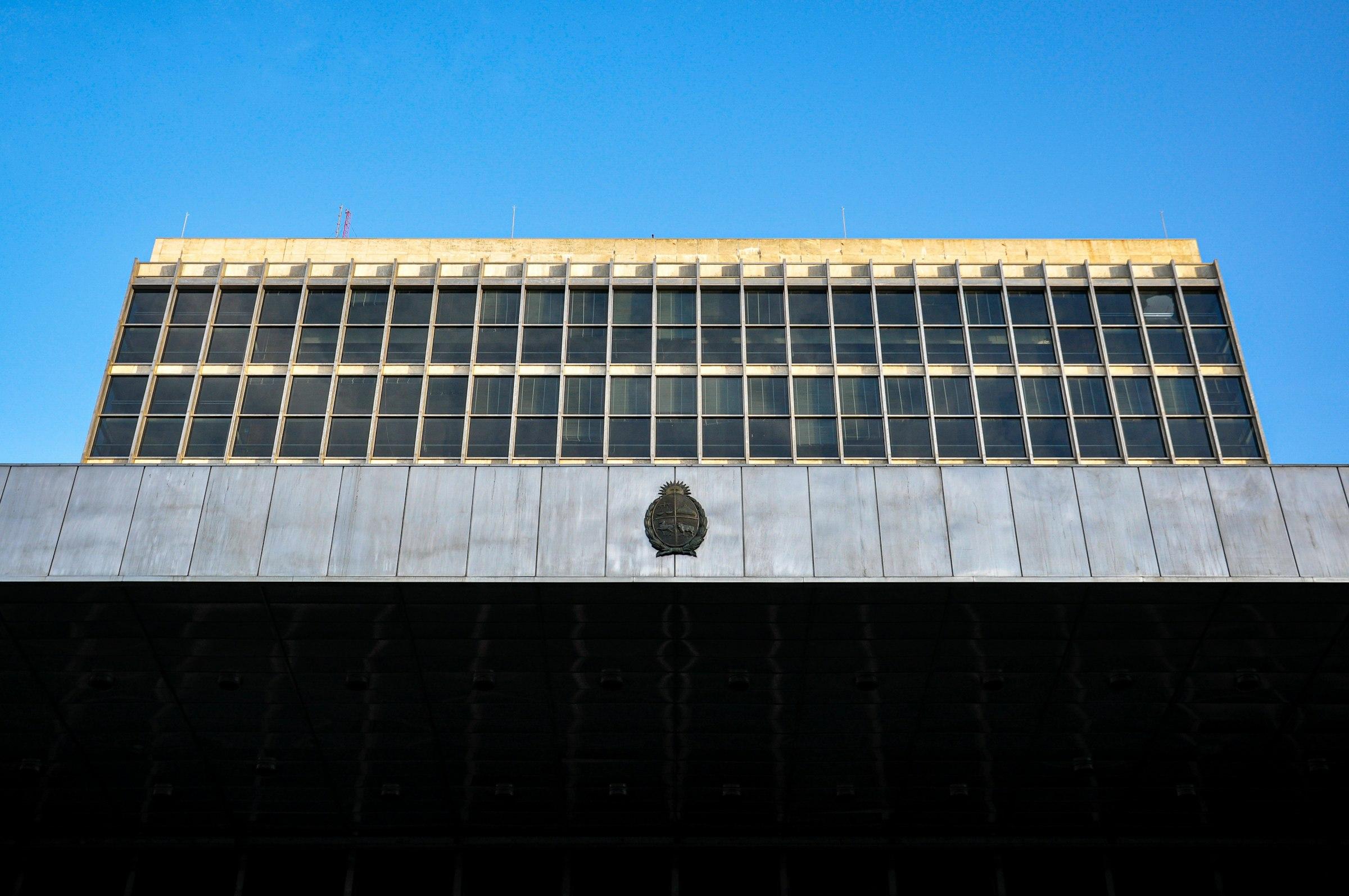 Modern building facade against a clear blue sky