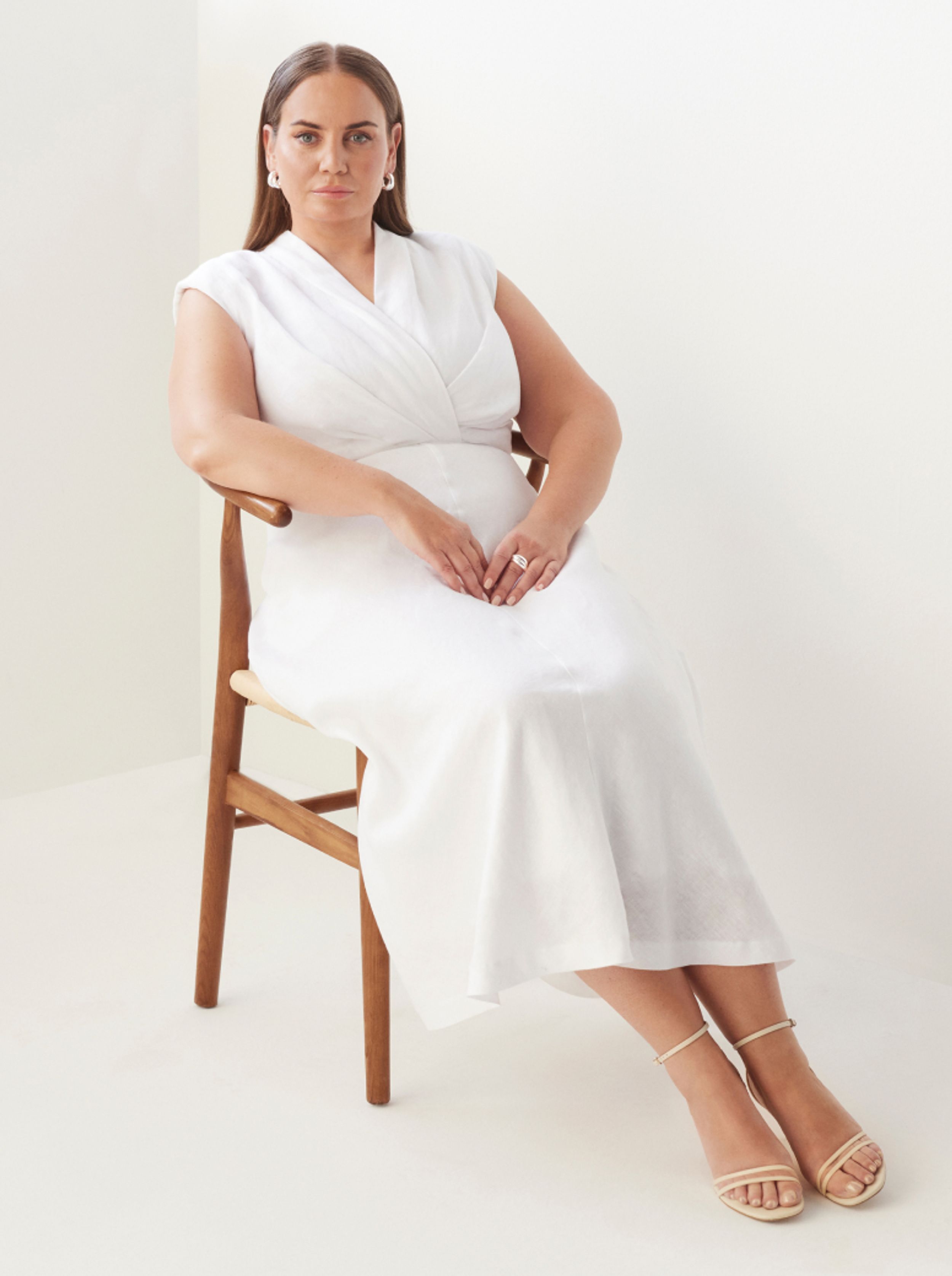 Jelena Dokic wears Commonry Tahli Dress and Sits On a Chair 