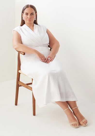 Jelena Dokic wears Commonry Tahli Dress and Sits On a Chair