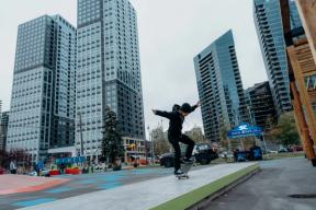 A photograph of a skateboarder doing a trick at Pixel Park in The C+E.