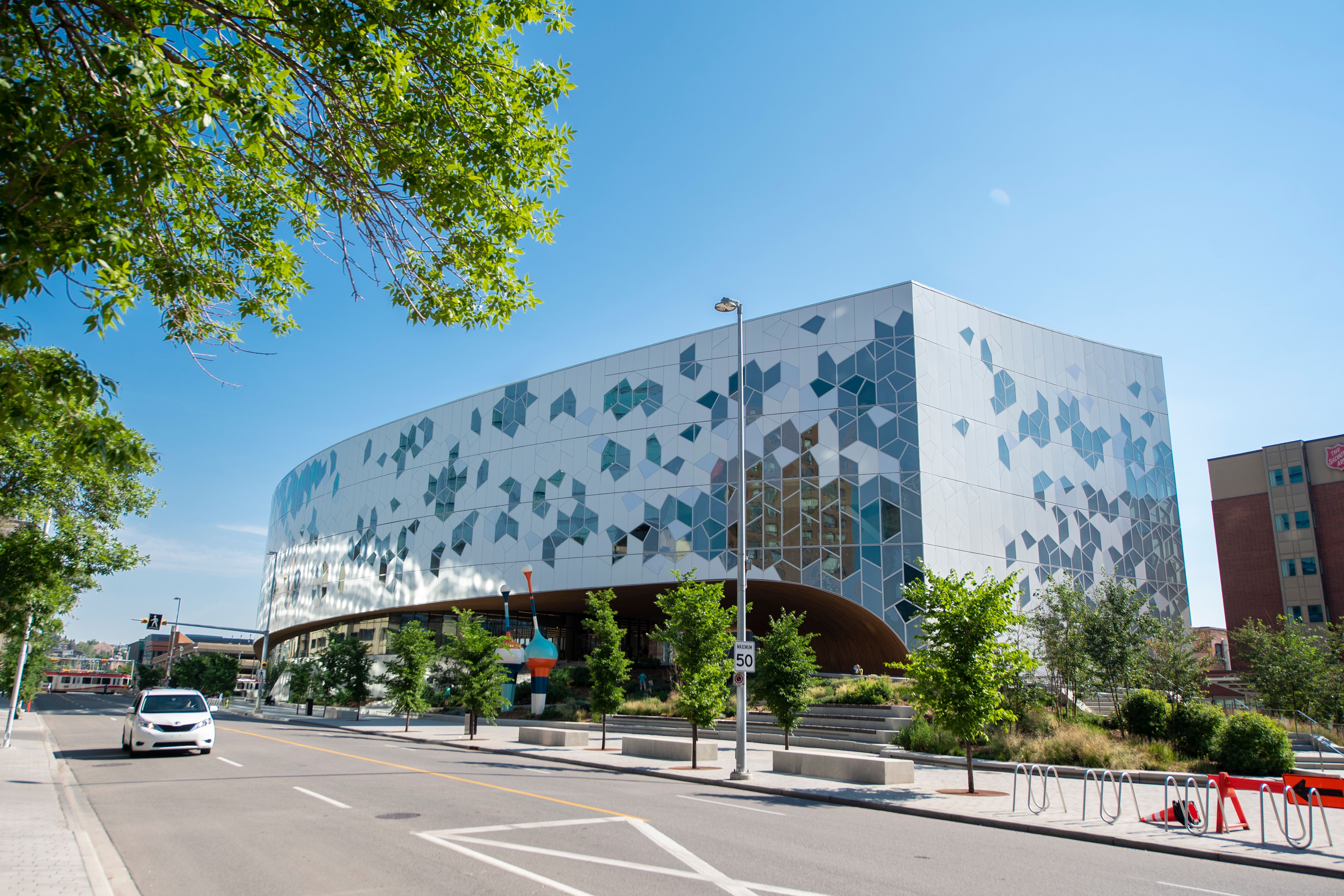 A photograph of the Central Library from 3rd Street SE in East Village.