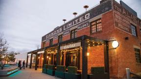 A photograph of the Simmons Building in the evening.