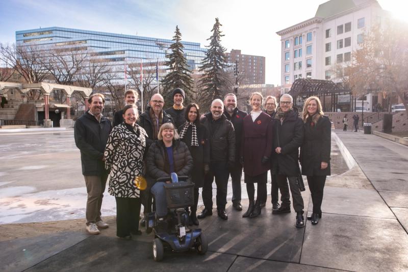 Olympic Plaza Design Team stands together in Olympic Plaza