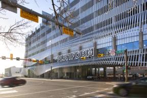 A photograph of Platform featuring the main entrance of the parking garage.