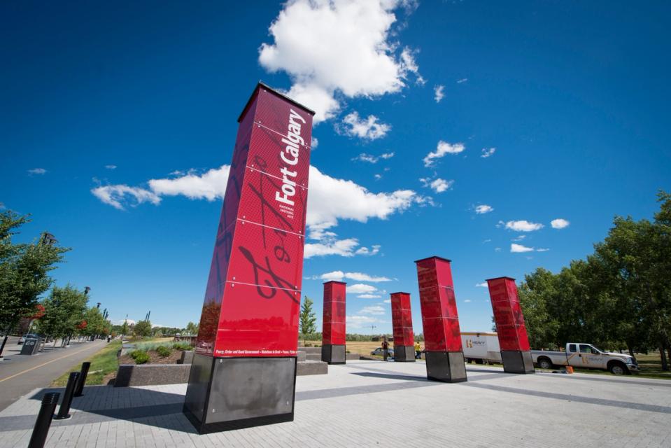 5 large sentinel structures, in RCMP red with the name Fort Calgary listed