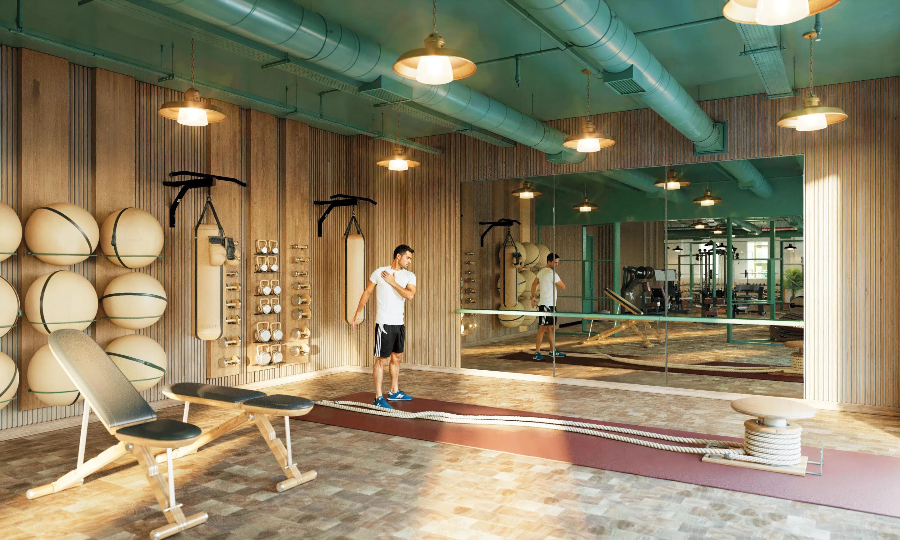 Gym floor with treadmills, free weights and resistance machines