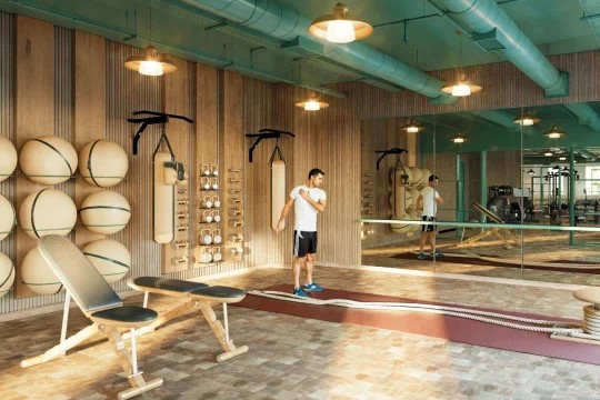 Yoga mats along a panoramic window over the London skyline