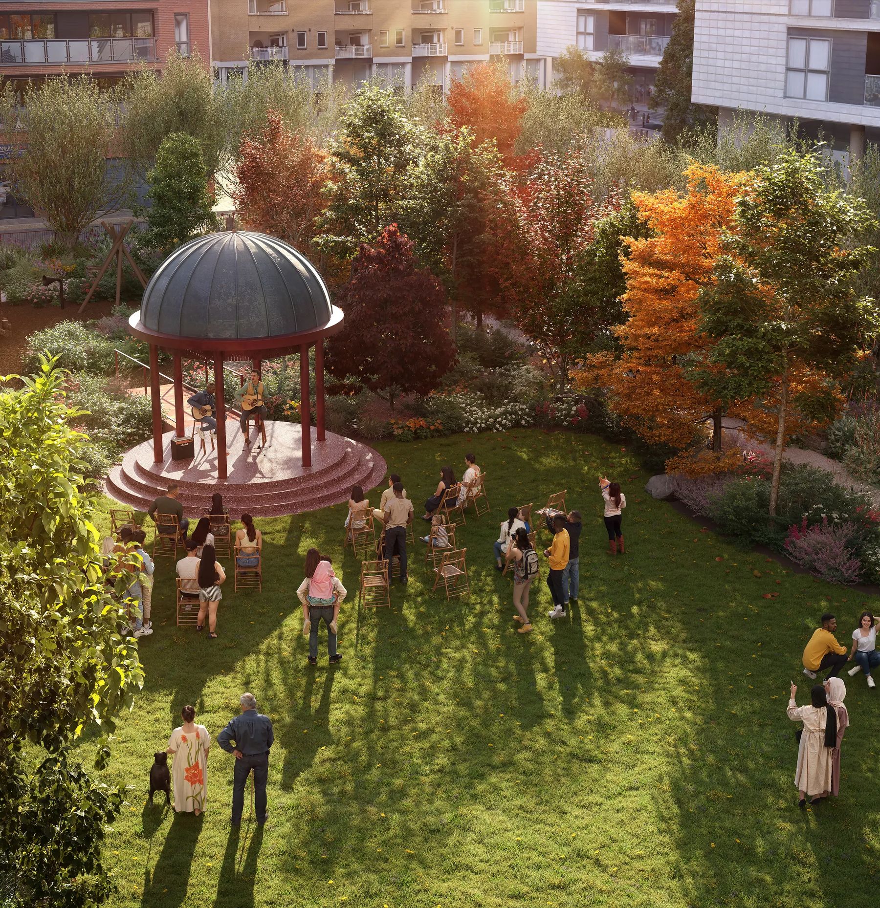 Garden square with domed bandstand, lawn and autumn trees