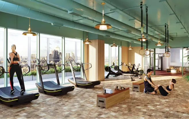 Gym with treadmills under a green ceiling, city beyond